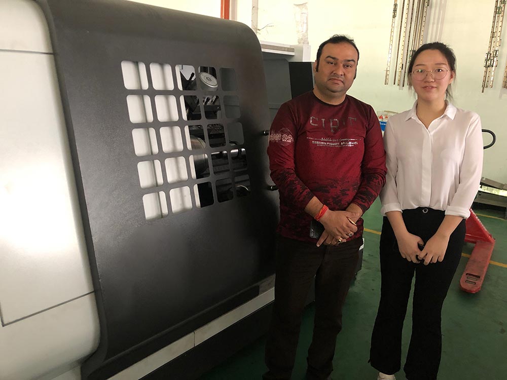 Indian customer came to the factory to inspect the CNC metal spinning machine which is ready to be delivered.